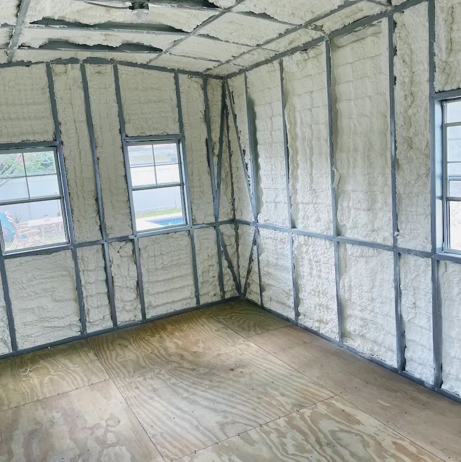 Closed-cell spray foam insulation applied to wall cavities in a residential project in Ross